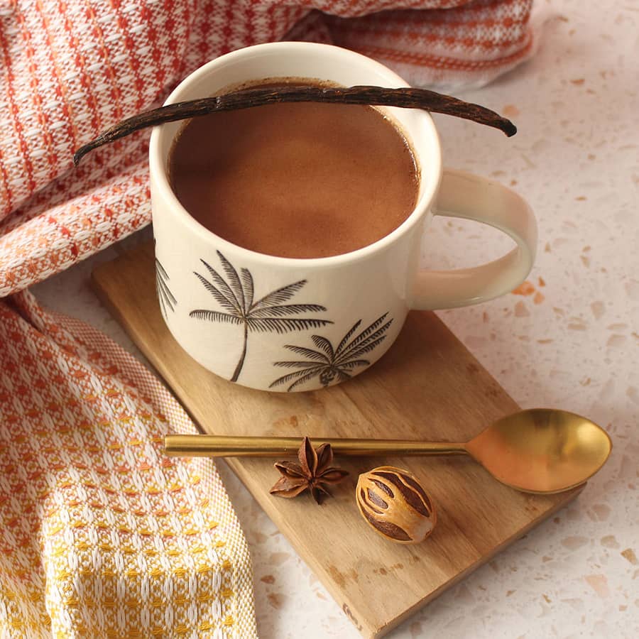 Coca tea in a palm tree mug