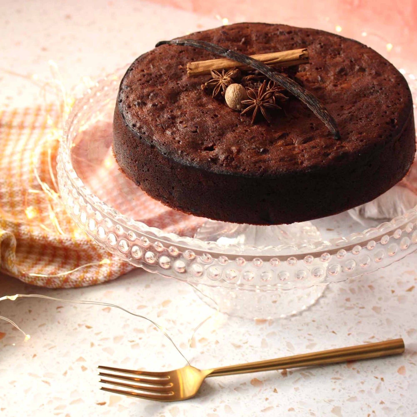 Picture of the rum cake on a cake stand