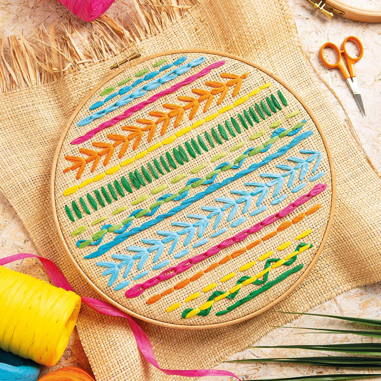 Image of raffia embroidery workshop sample hoop
