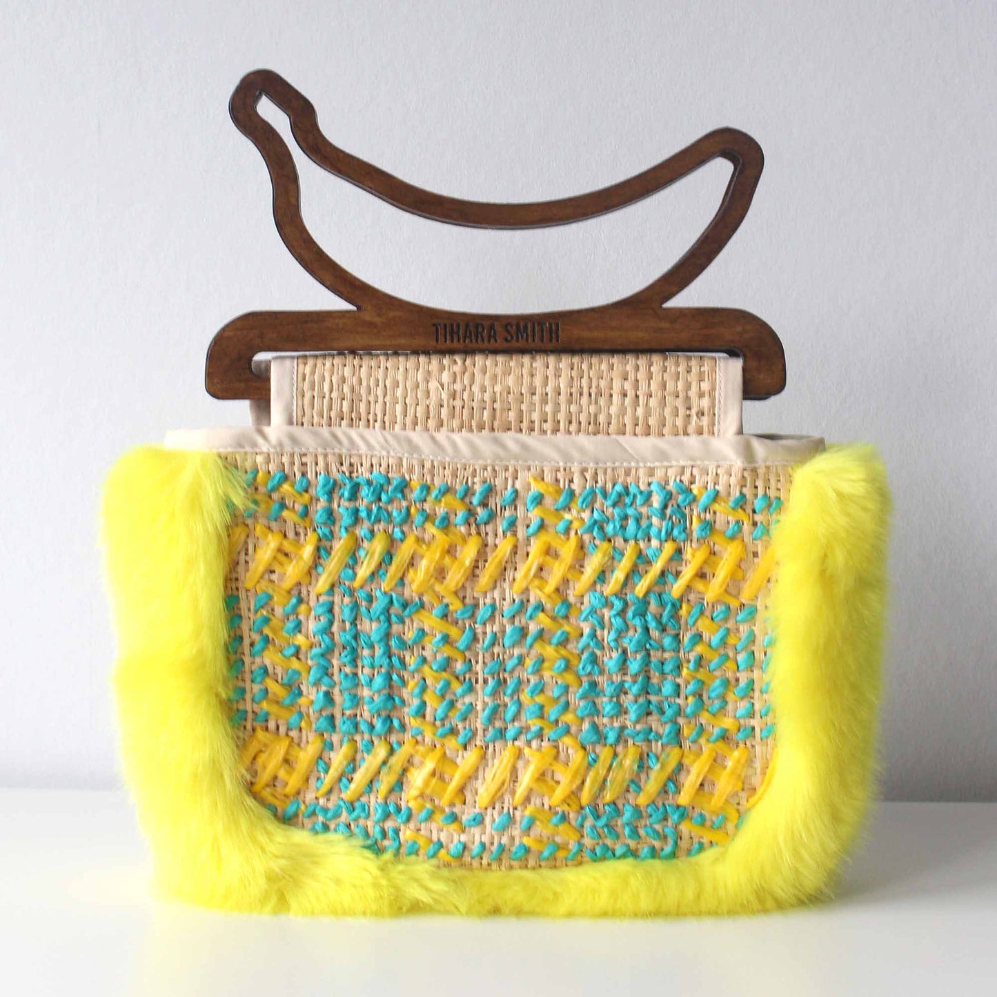 Load image into Gallery viewer, Montserrat Raffia Embroidered and Faux Fur Banana Handle Bag - Yellow and Blue
